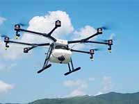 大疆将推农作物喷药无人机 是人工喷洒效率的40倍